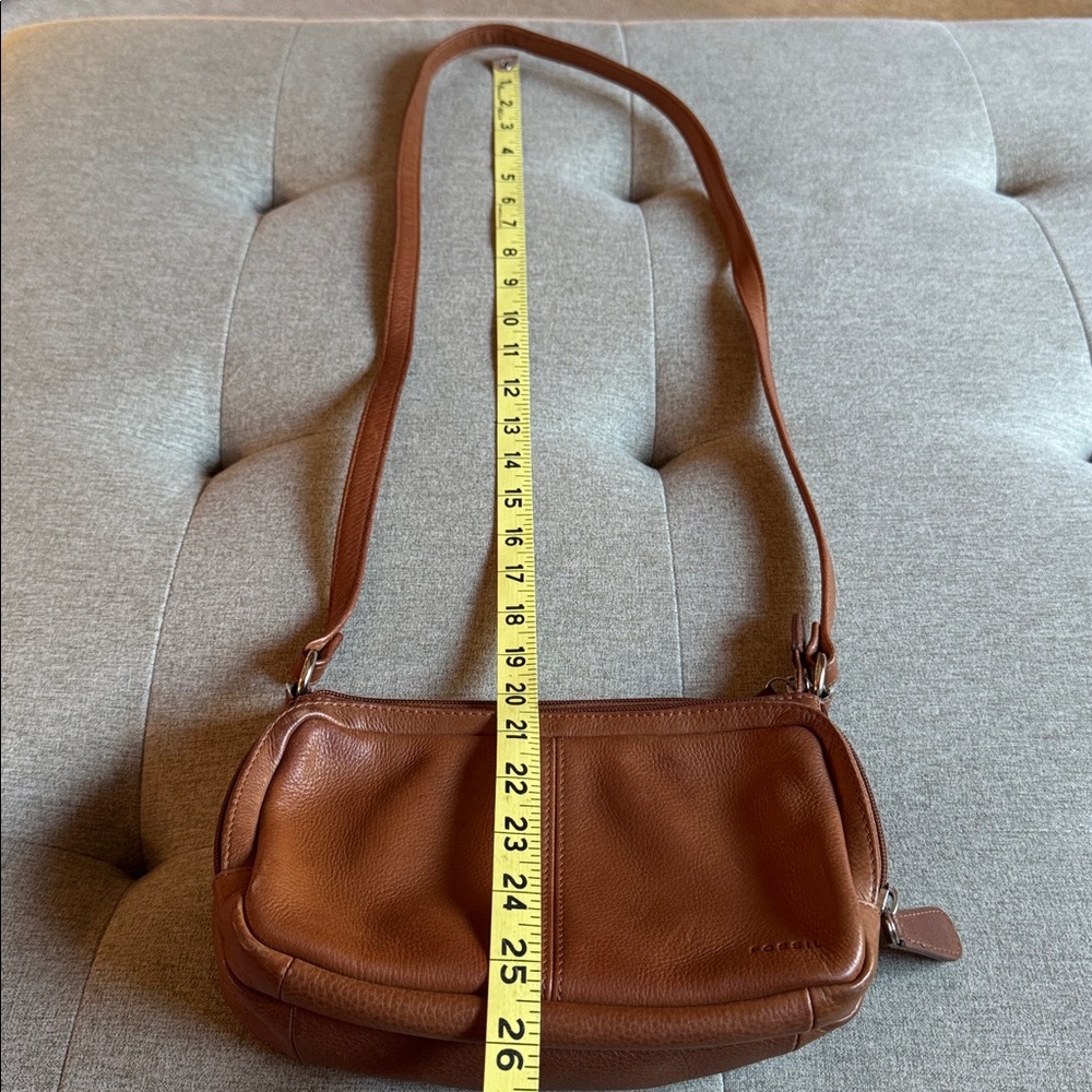 Gorgeous supple camel leather Fossil crossbody. Great travel bag.